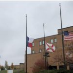 U.S. flag flying at half staff in West Bend